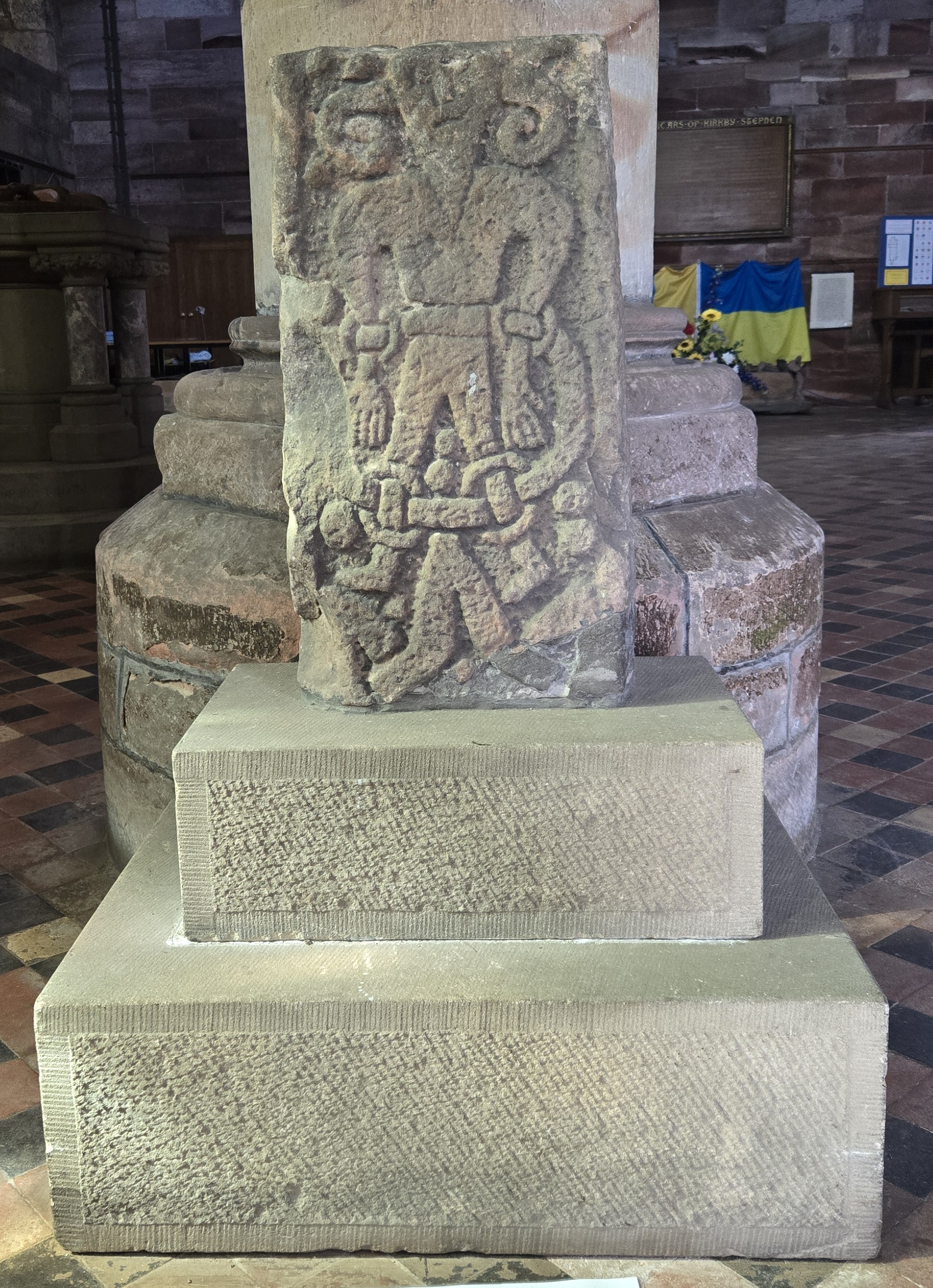 Stone carving of Norse god Loki